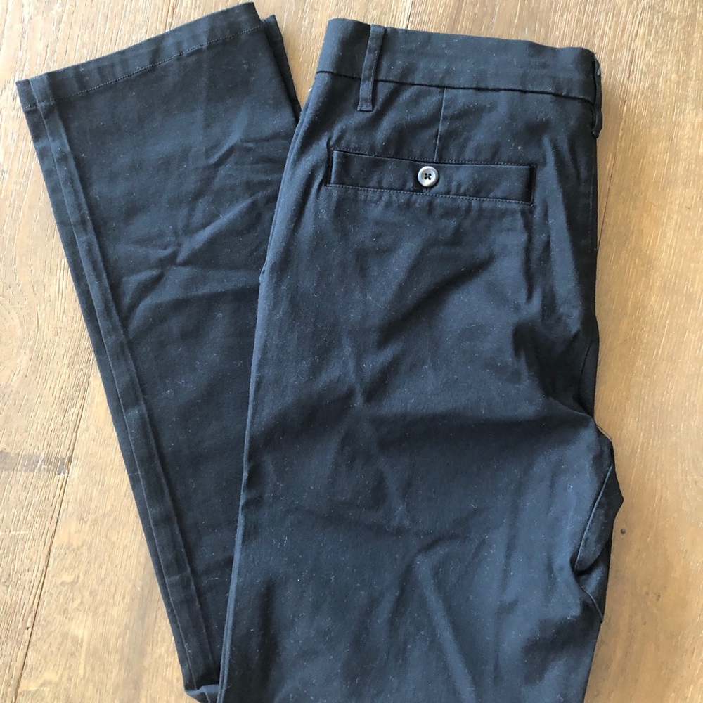 Black chinos with button pocket